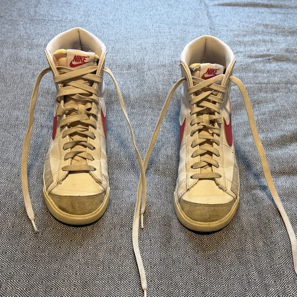 Women’s Nike White and Pink High-Top Sneakers